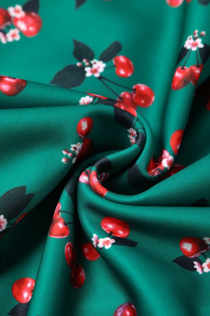 Dolly and Dotty Emerald Cherry Print Retro Dress, Fabric Close up