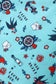 Nautical-themed fabric pattern with anchors, stars, and 'I love you' text, close up
