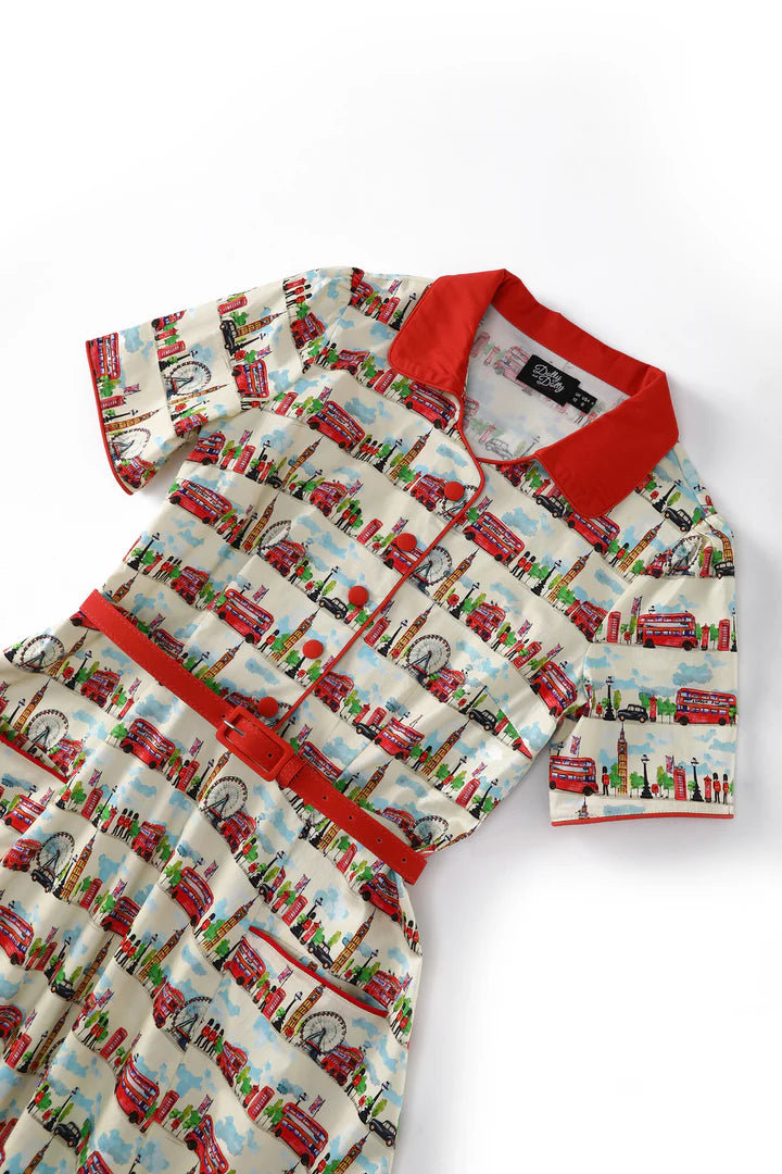 Dress with red collar and trim featuring a retro London pattern on a white background